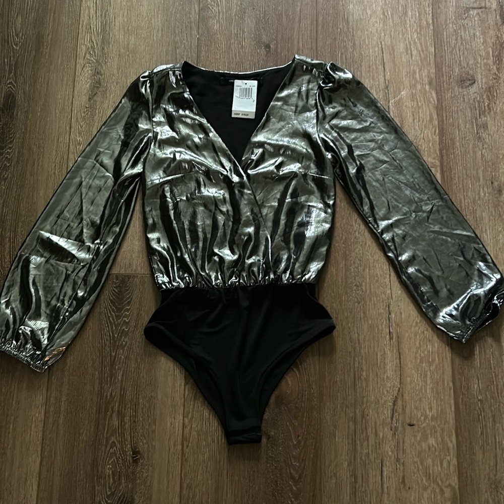 Womens body suit. New with tags